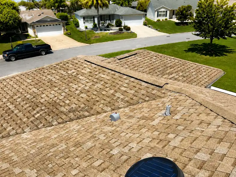 Full re-roof completed, neighborhood aerial view